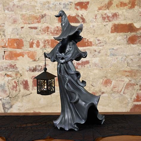 Voodoo witch with illuminated lantern Cracker Barrel